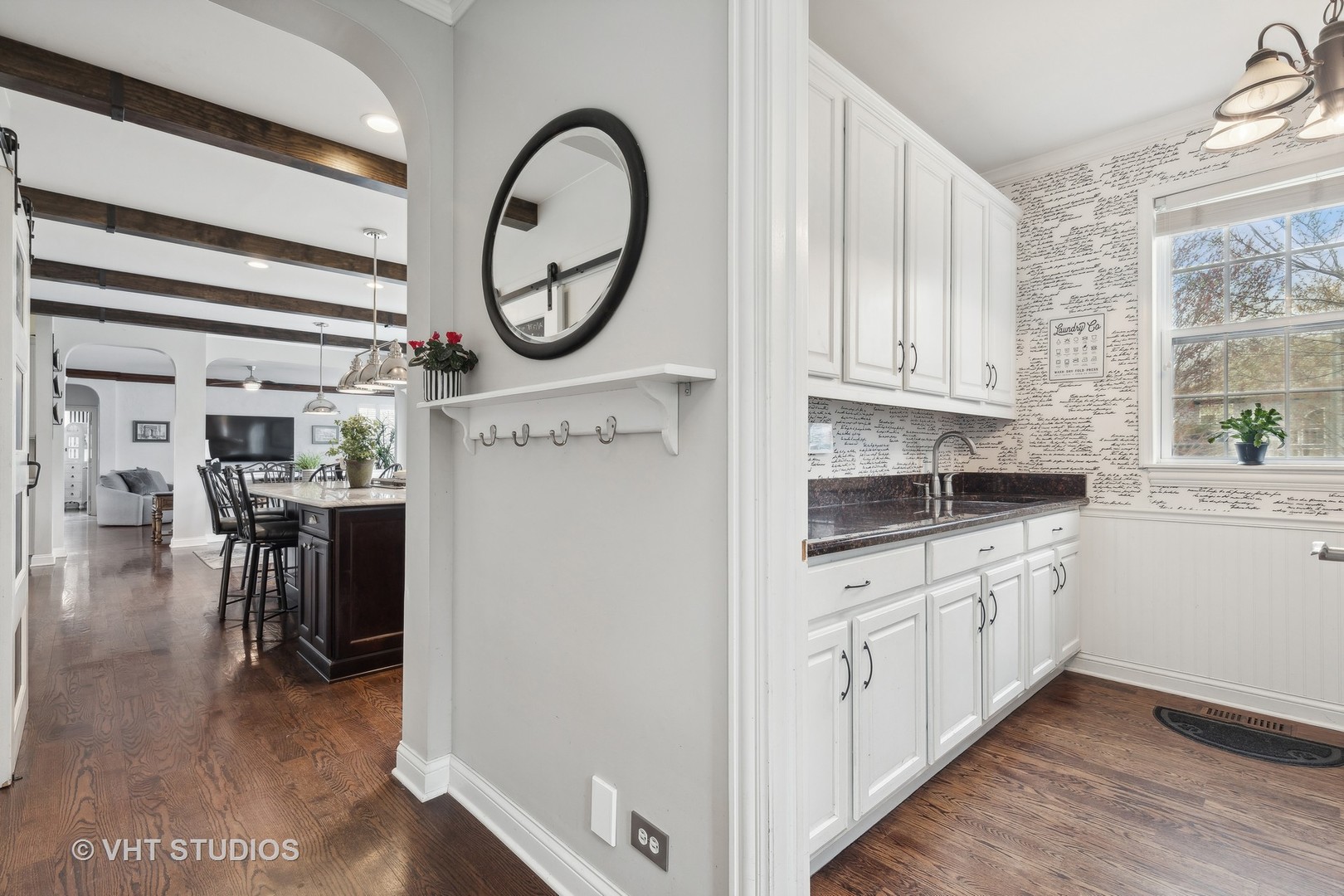 303 Saddle Lane Fox River Grove, IL 60021 - Photo 33 of 70 a kitchen with a refrigerator a stove top oven a sink and a window