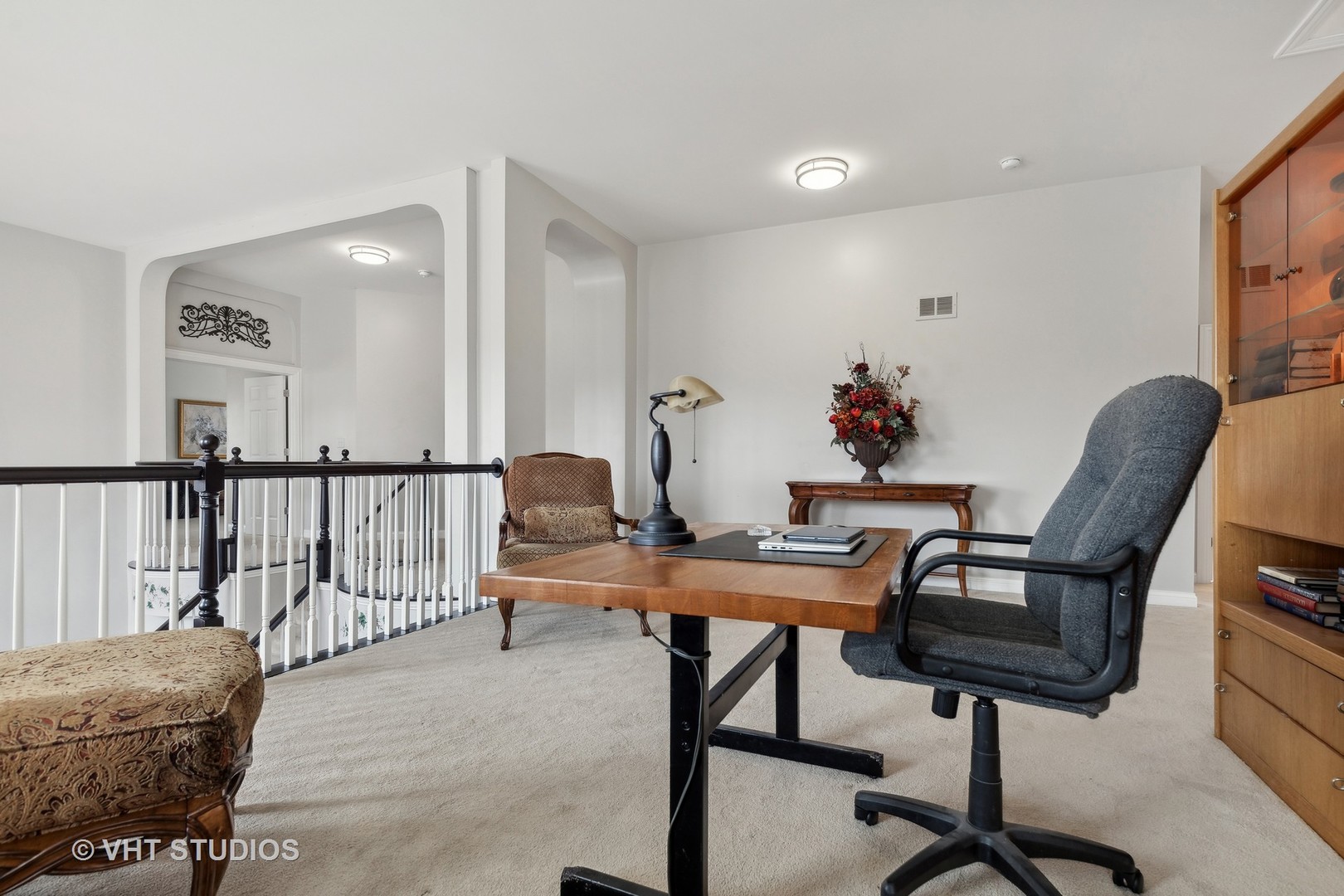 303 Saddle Lane Fox River Grove, IL 60021 - Photo 38 of 70 a view of a livingroom with furniture and a workspace