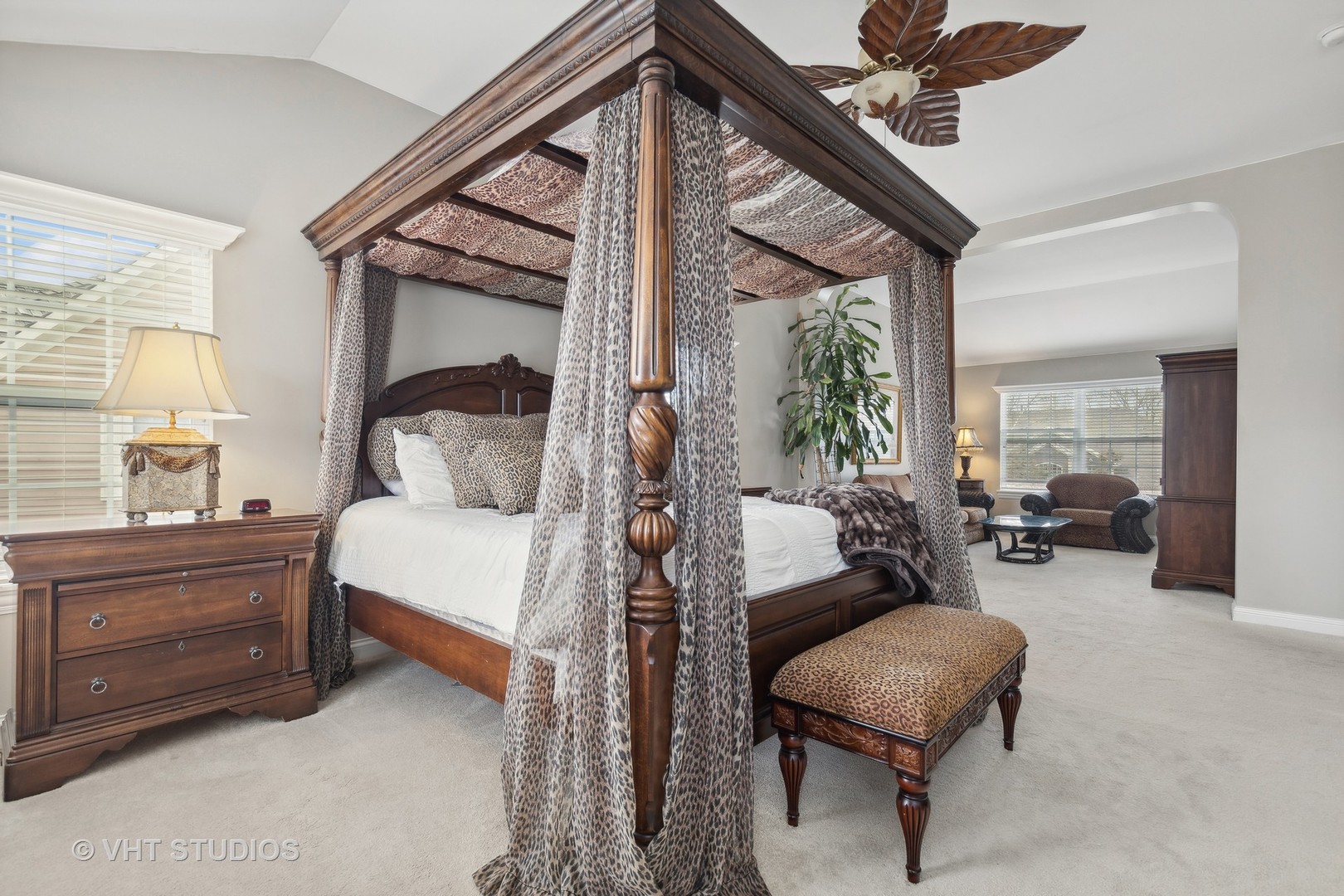 303 Saddle Lane Fox River Grove, IL 60021 - Photo 48 of 70 a bedroom with furniture and a chandelier