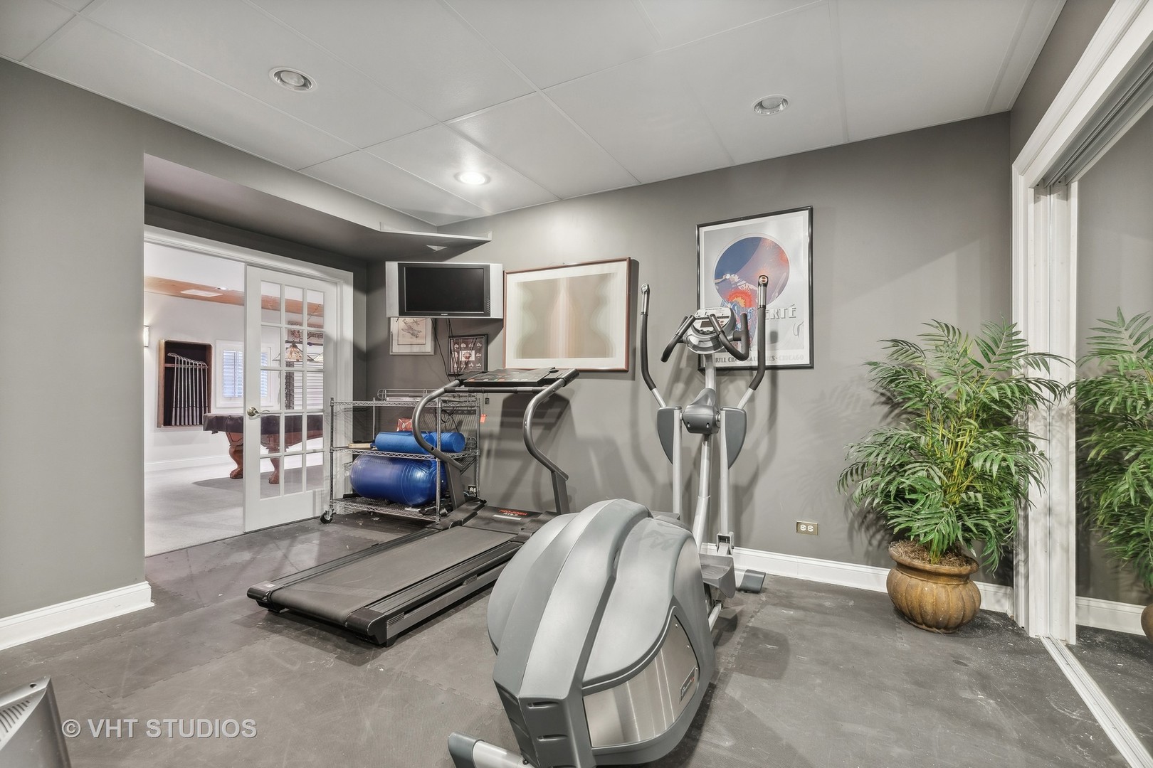 303 Saddle Lane Fox River Grove, IL 60021 - Photo 62 of 70 a view of a room with gym equipment