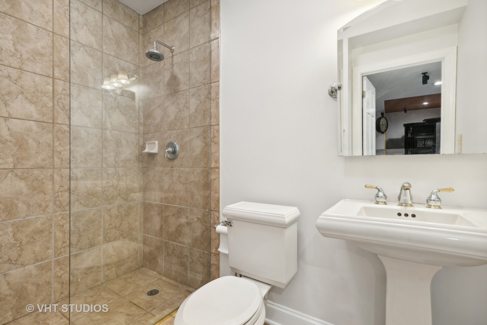 303 Saddle Lane Fox River Grove, IL 60021 - Photo 63 of 70 a bathroom with a sink toilet and shower