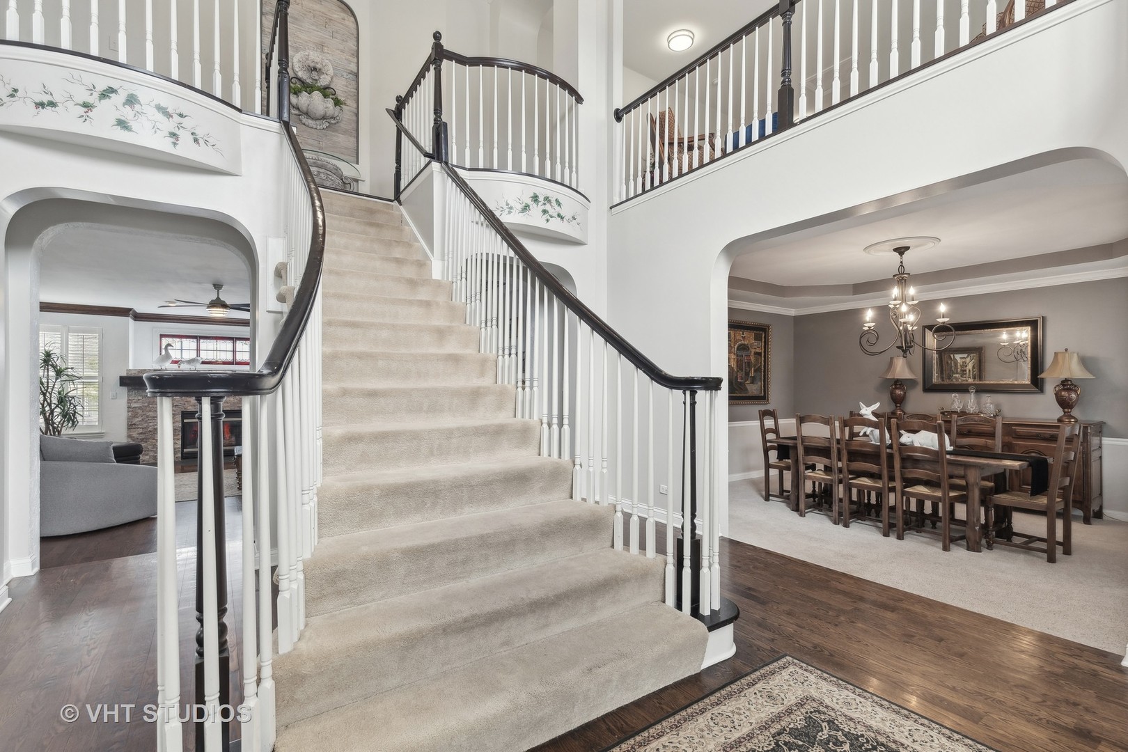 303 Saddle Lane Fox River Grove, IL 60021 - Photo 8 of 70 a view of entryway and hall with wooden floor