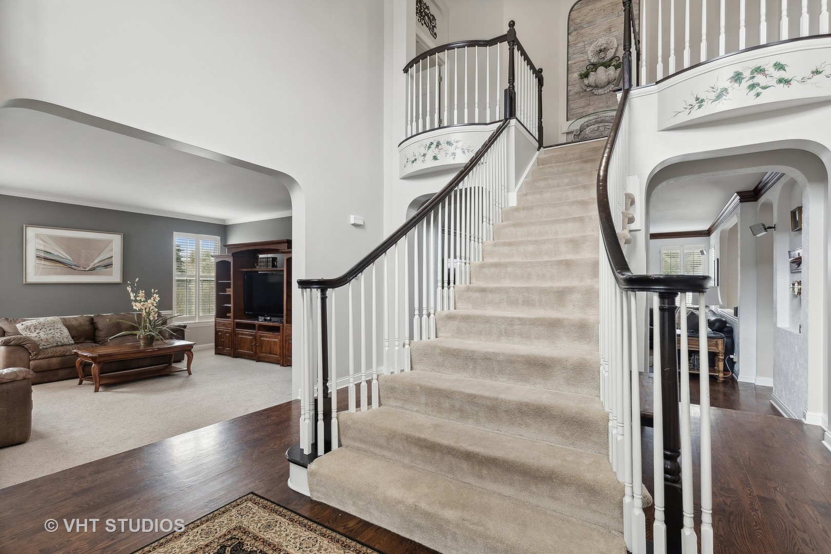 303 Saddle Lane Fox River Grove, IL 60021 - Photo 9 of 70 a view of entryway and hall with wooden floor