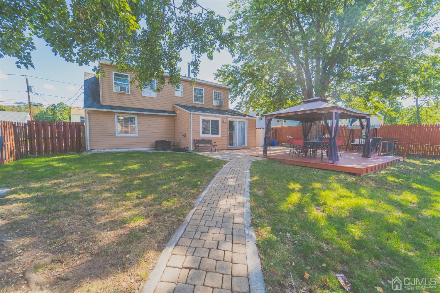 22 Richmond Road Edison, NJ 08817 - Photo 19 of 19 a front view of a house with garden