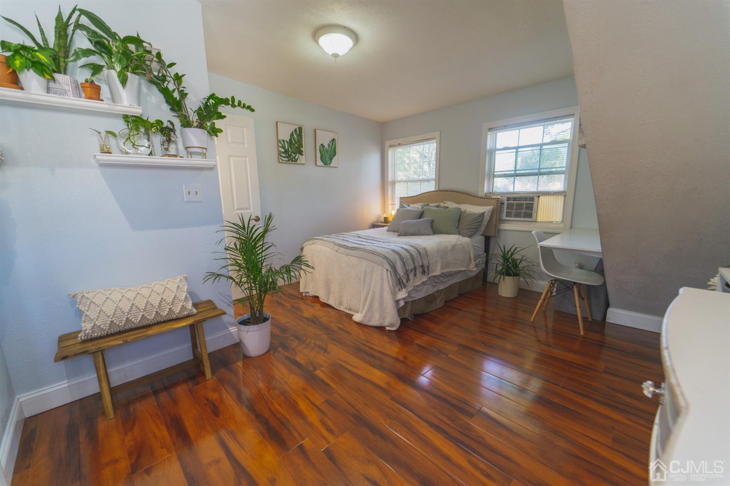 22 Richmond Road Edison, NJ 08817 - Photo 7 of 19 a bedroom with bed and window with wooden floor