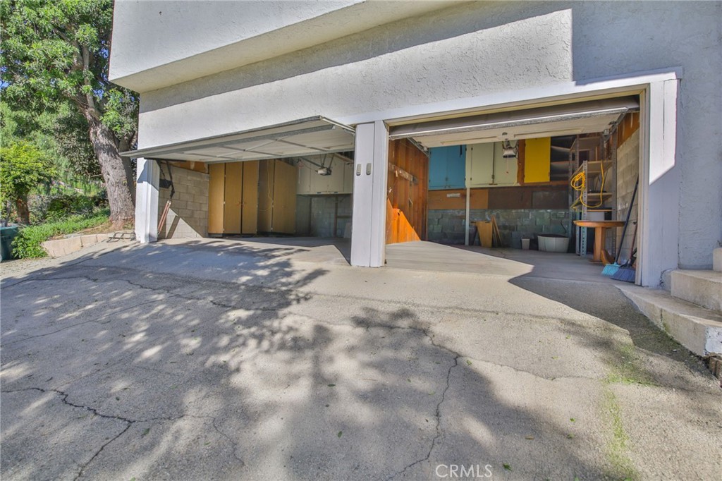 1707 Nabal Road La Habra Heights, CA 90631 - Photo 15 of 64 a view of a house with backyard and trees