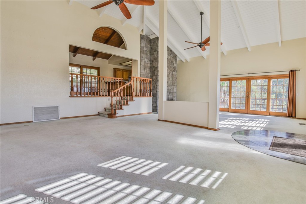 1707 Nabal Road La Habra Heights, CA 90631 - Photo 18 of 64 Looking across living room to upstairs dining area