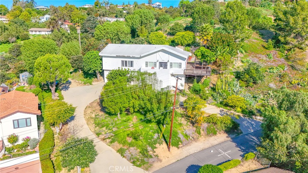 1707 Nabal Road La Habra Heights, CA 90631 - Photo 2 of 64 a aerial view of a house with a yard and potted plants