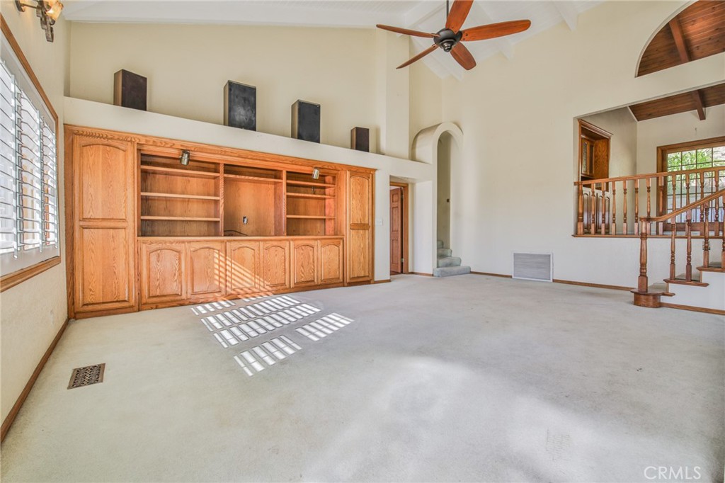 1707 Nabal Road La Habra Heights, CA 90631 - Photo 21 of 64 a view of an empty room with wooden floor and windows