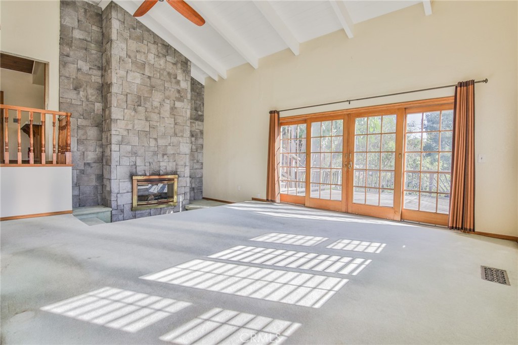 1707 Nabal Road La Habra Heights, CA 90631 - Photo 22 of 64 a view of an empty room with a window and a fireplace
