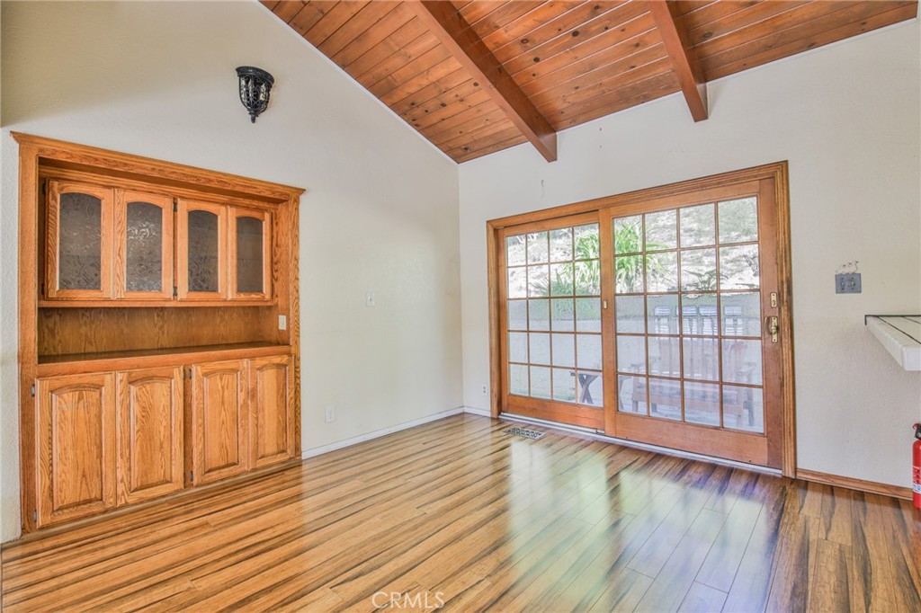 1707 Nabal Road La Habra Heights, CA 90631 - Photo 24 of 64 a view of an empty room with wooden floor and a window