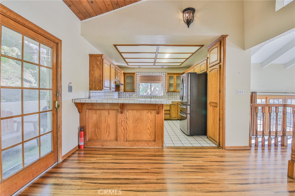 1707 Nabal Road La Habra Heights, CA 90631 - Photo 25 of 64 a view of a kitchen with furniture and wooden floor