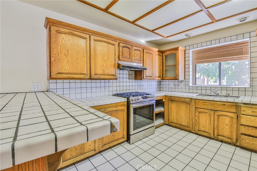 1707 Nabal Road La Habra Heights, CA 90631 - Photo 26 of 64 a bedroom with a bed and a large window