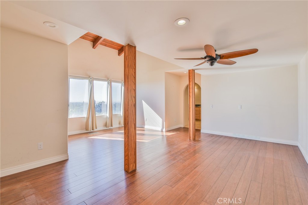 1707 Nabal Road La Habra Heights, CA 90631 - Photo 28 of 64 a view of empty room with wooden floor and fan