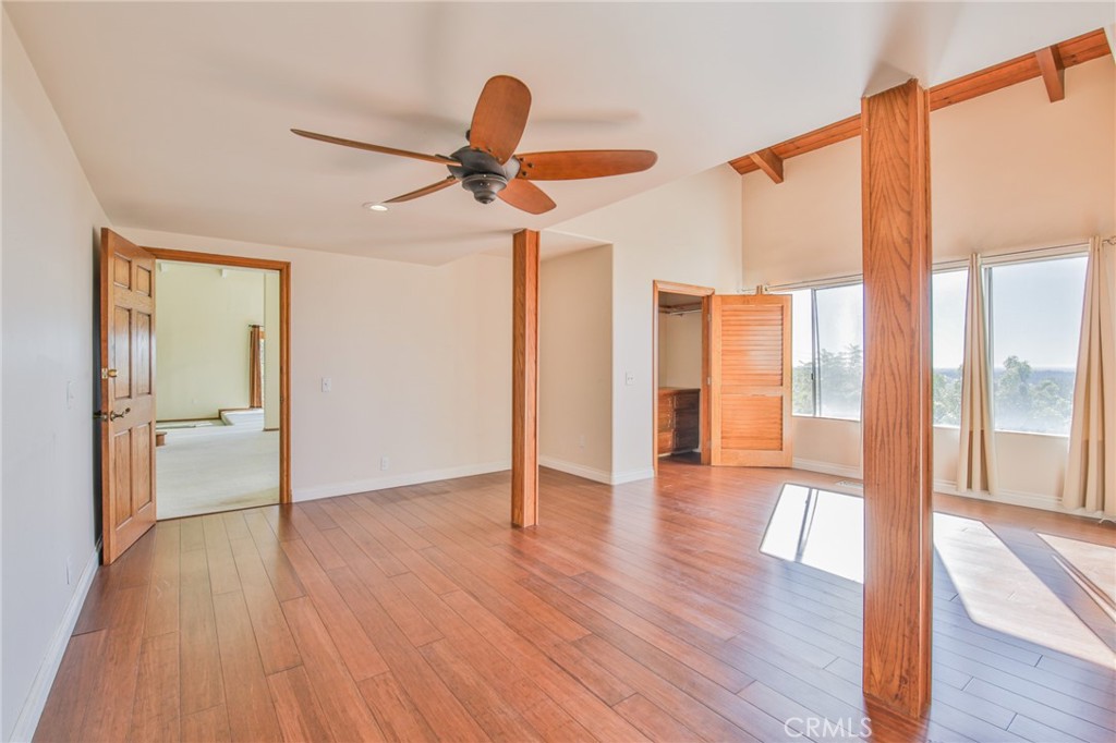 1707 Nabal Road La Habra Heights, CA 90631 - Photo 29 of 64 a view of empty room with wooden floor and fan