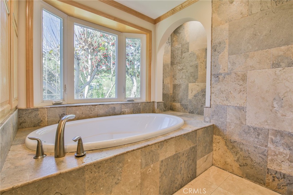 1707 Nabal Road La Habra Heights, CA 90631 - Photo 34 of 64 a bathroom with a bathtub and shower
