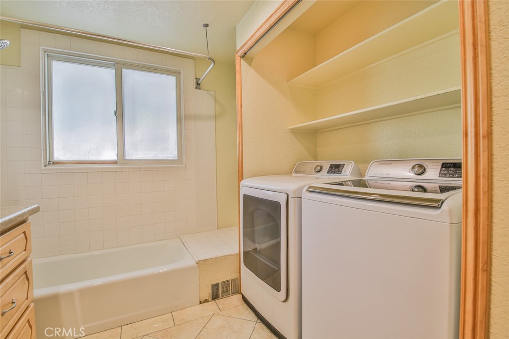 1707 Nabal Road La Habra Heights, CA 90631 - Photo 41 of 64 a bathroom with a bathtub and a shower
