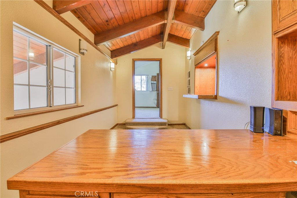 1707 Nabal Road La Habra Heights, CA 90631 - Photo 48 of 64 a view of an empty room with window and wooden floor