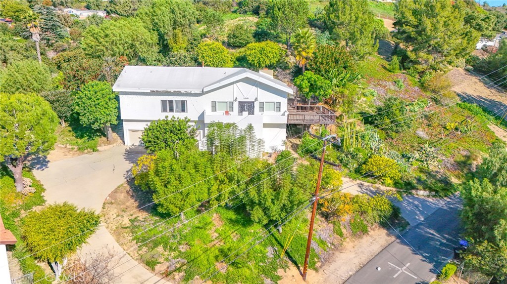 1707 Nabal Road La Habra Heights, CA 90631 - Photo 5 of 64 a aerial view of a house with a yard and large trees