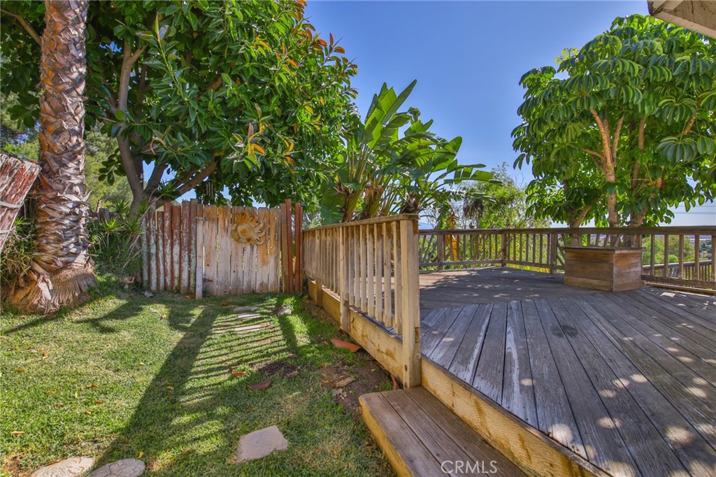 1707 Nabal Road La Habra Heights, CA 90631 - Photo 52 of 64 a view of backyard with wooden fence and large trees