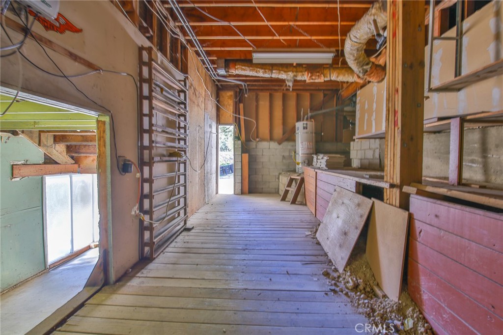 1707 Nabal Road La Habra Heights, CA 90631 - Photo 62 of 64 a hallway with wooden floor and windows