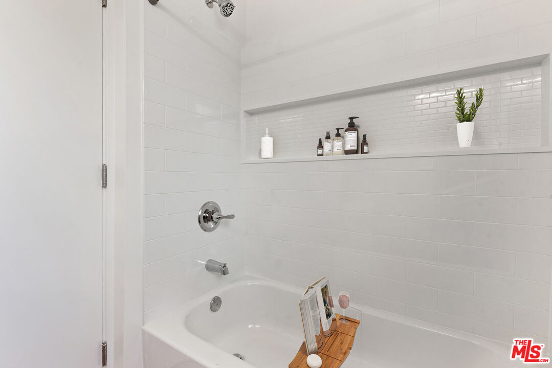 1314 10th Street, Unit A Santa Monica, CA 90401 - Photo 8 of 53 a bathroom with a bathtub