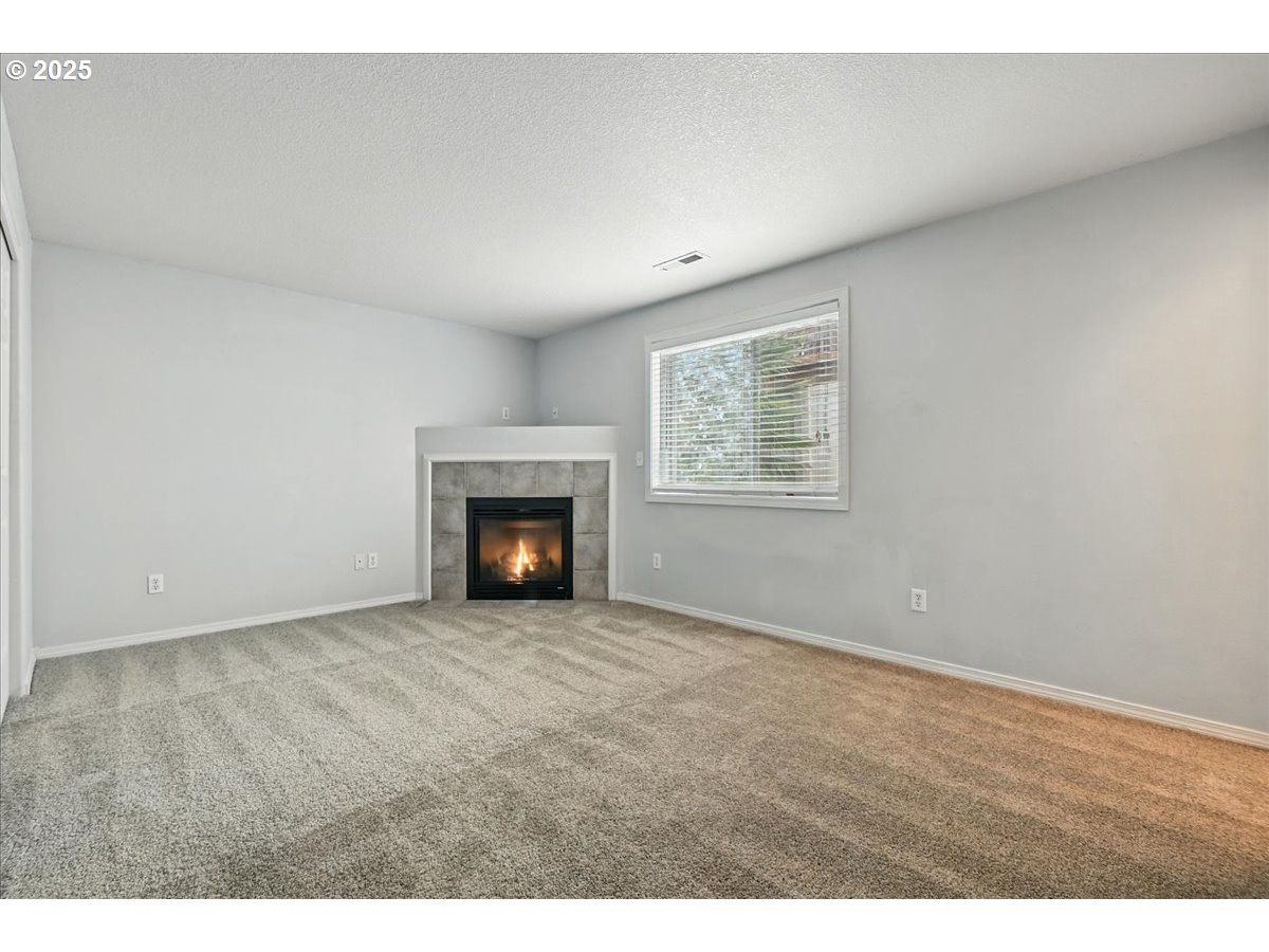 3044 South 3rd Way Ridgefield, WA 98642 - Photo 18 of 34 a view of an empty room with a window