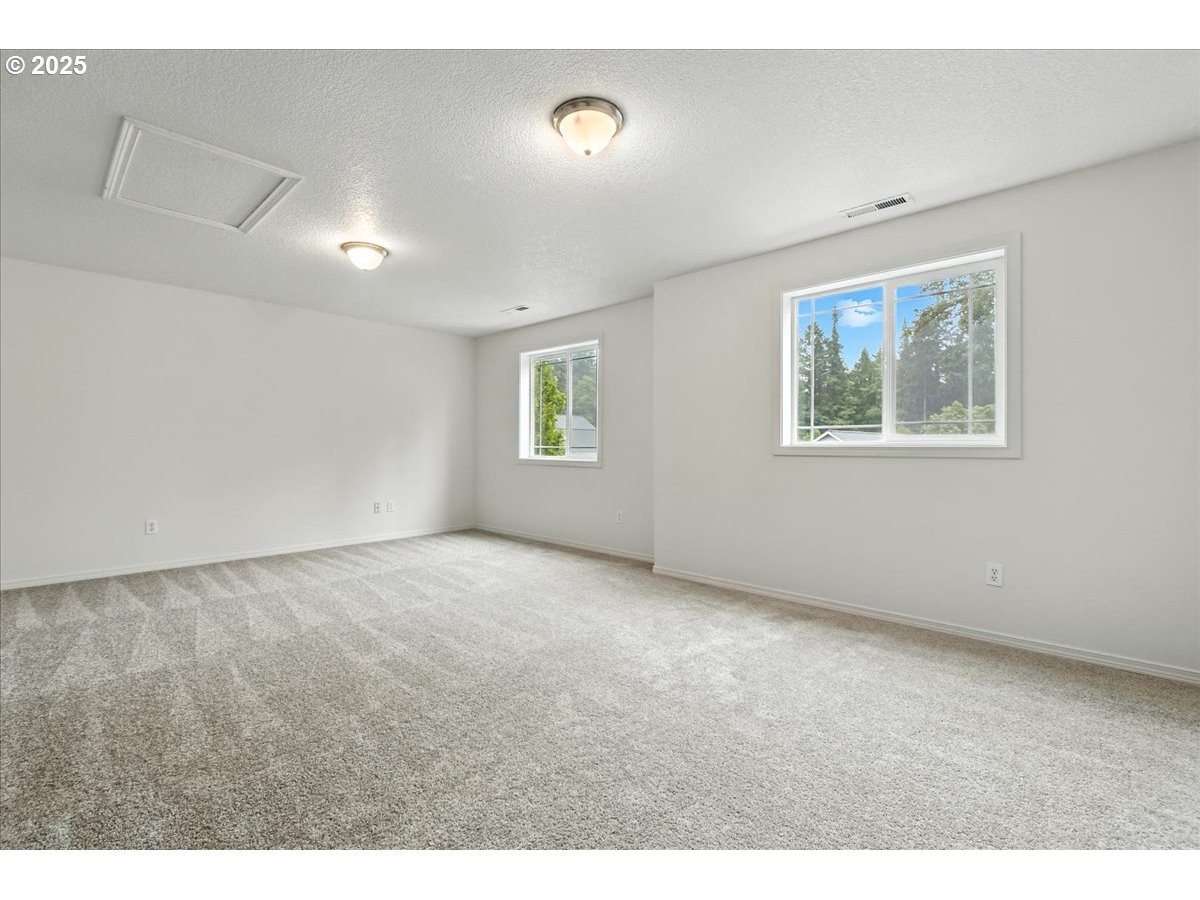 3044 South 3rd Way Ridgefield, WA 98642 - Photo 26 of 34 a view of an empty room with a window