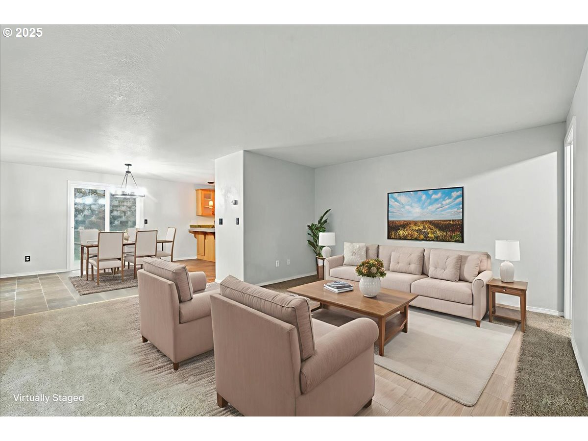 3044 South 3rd Way Ridgefield, WA 98642 - Photo 6 of 34 a living room with furniture and a table