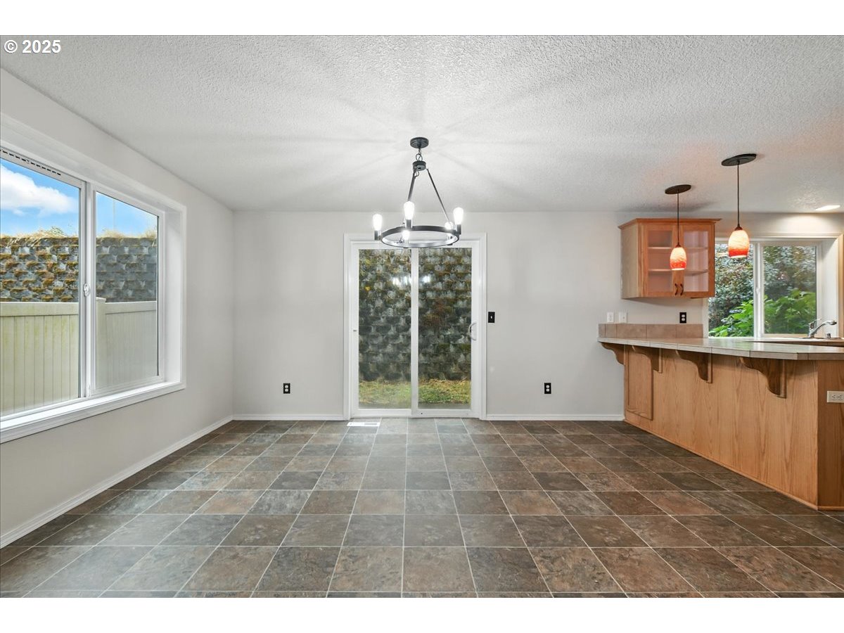 3044 South 3rd Way Ridgefield, WA 98642 - Photo 9 of 34 a view of an empty room with a window