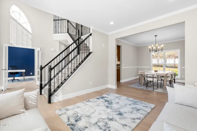 a kitchen with granite countertop a sink and cabinets