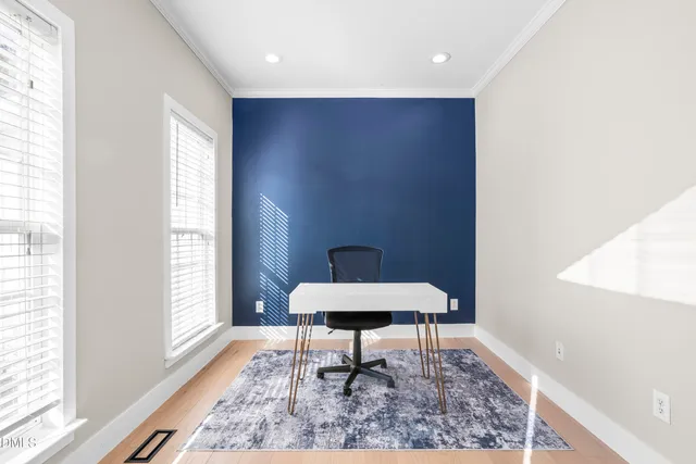 a kitchen with stainless steel appliances granite countertop a sink refrigerator stove and a granite counter top