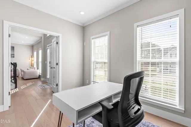 a kitchen with stainless steel appliances granite countertop a refrigerator a stove top oven a sink and dishwasher