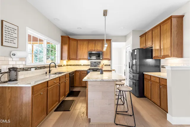 a bathroom with a sink toilet and mirror