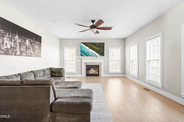 a spacious bedroom with a large bed and a couch