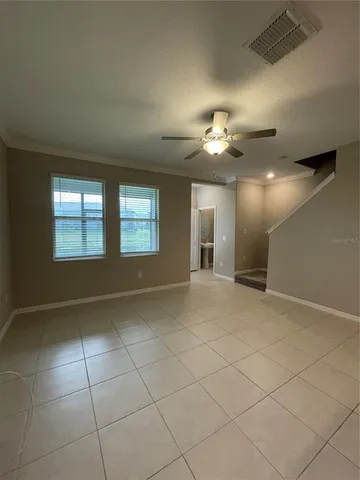 a view of entryway and kitchen