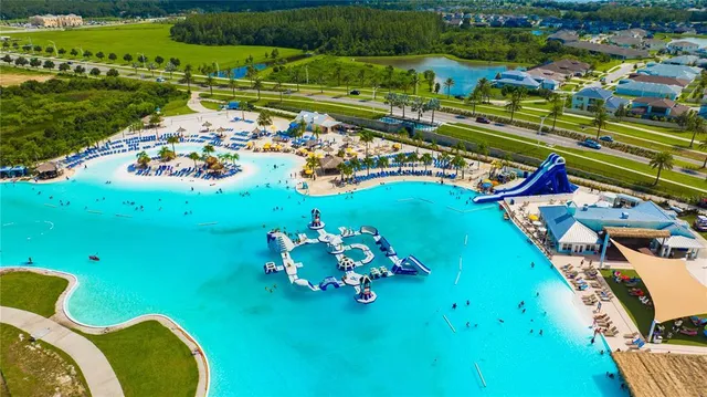 a view of a terrace with outdoor seating and water view