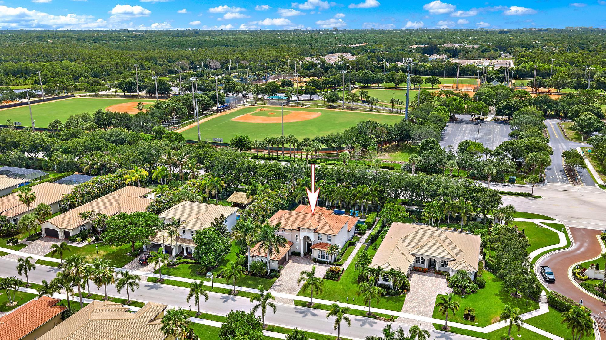 283 Rudder Cay Way Jupiter, FL 33458 - Photo 24 of 41 an aerial view of residential houses with outdoor space and street view