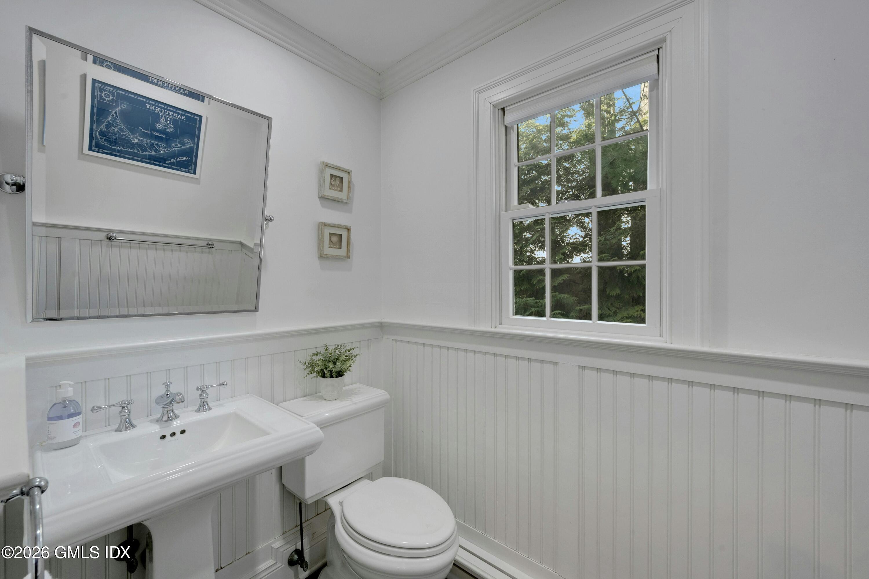 98 Hillcrest Park Road Cos Cob, CT 06807 - Photo 11 of 27 a bathroom with a sink mirror and toilet