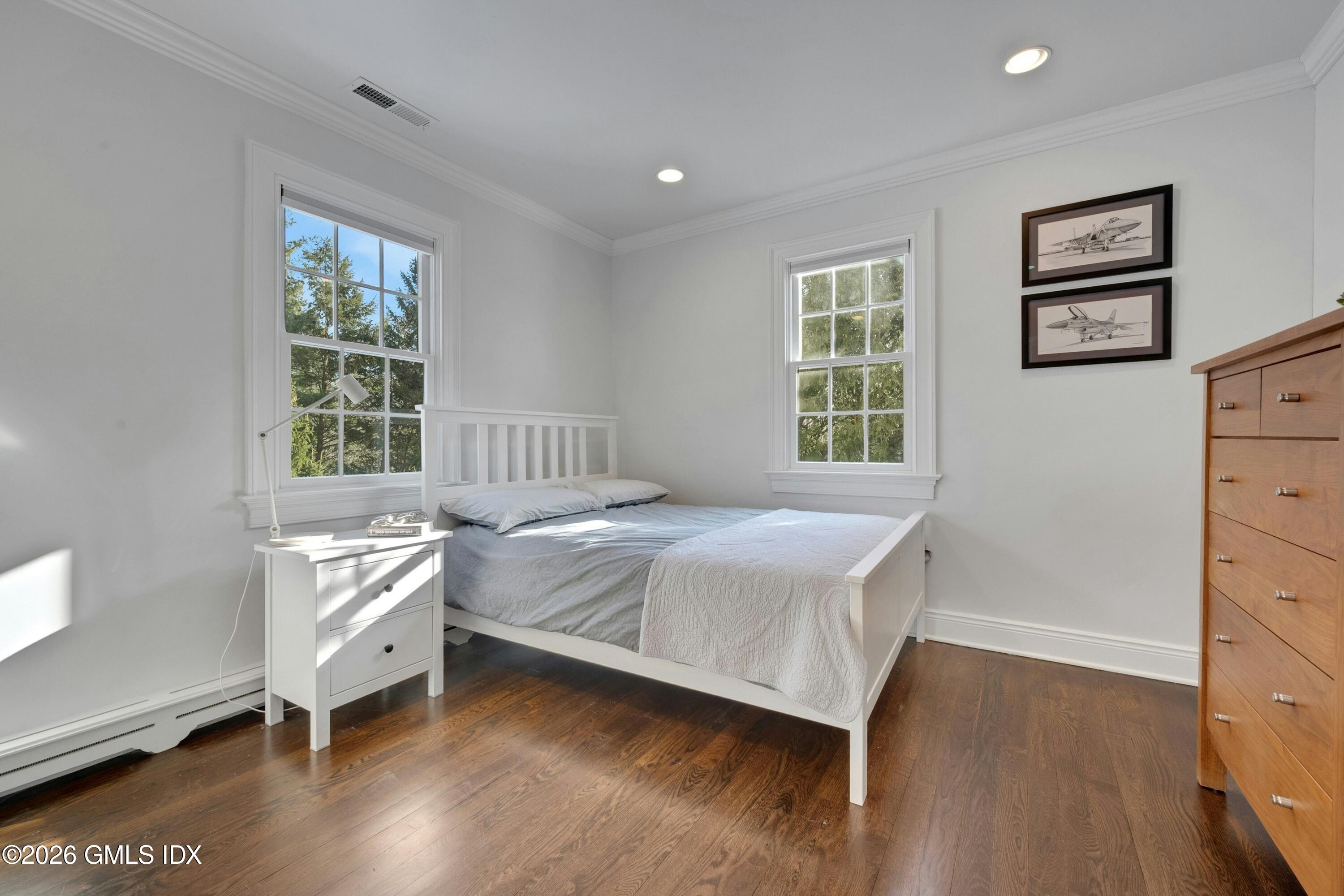 98 Hillcrest Park Road Cos Cob, CT 06807 - Photo 14 of 27 a bedroom with a bed and a window