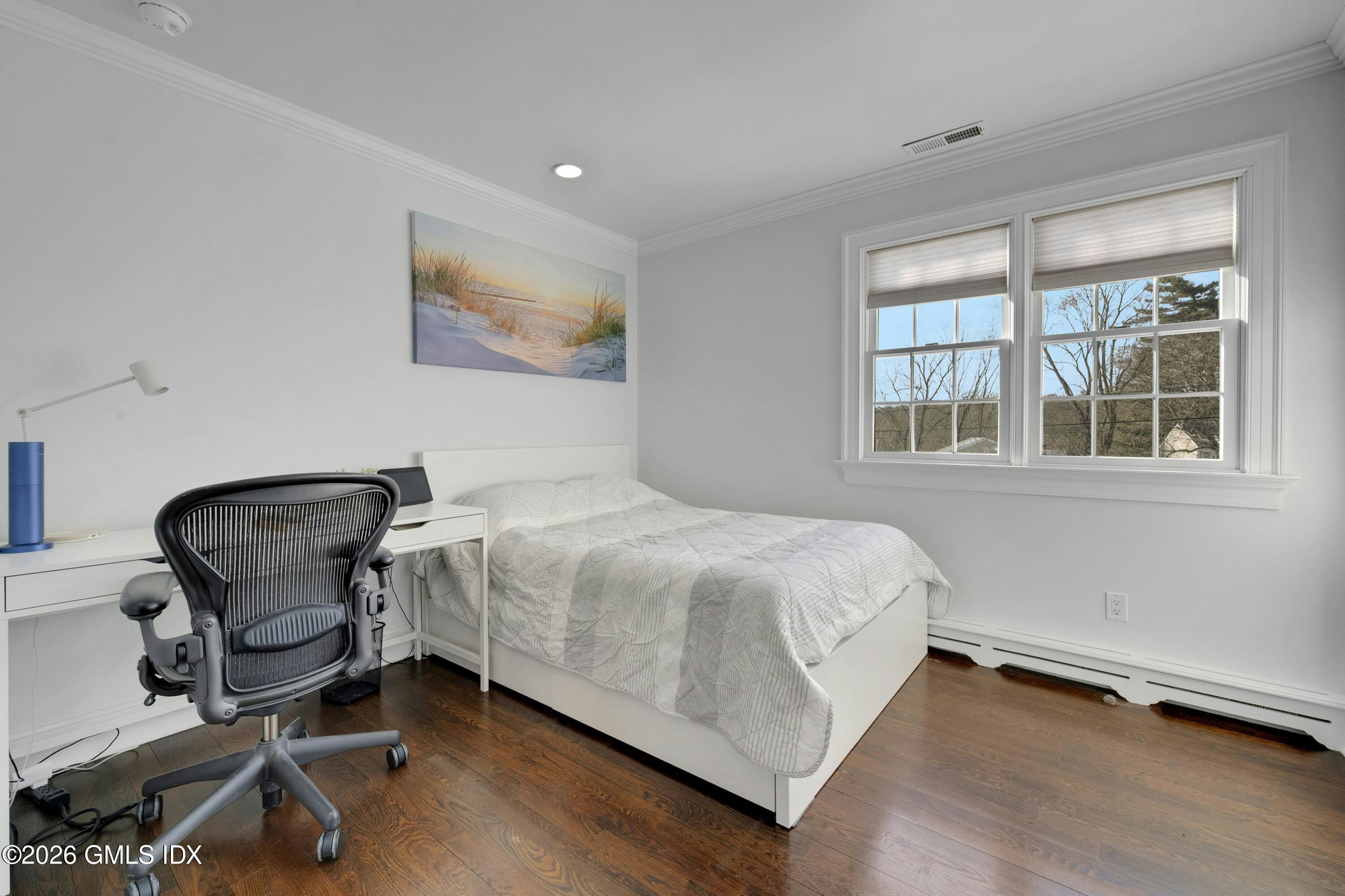 98 Hillcrest Park Road Cos Cob, CT 06807 - Photo 16 of 27 a bedroom with a bed chair and window