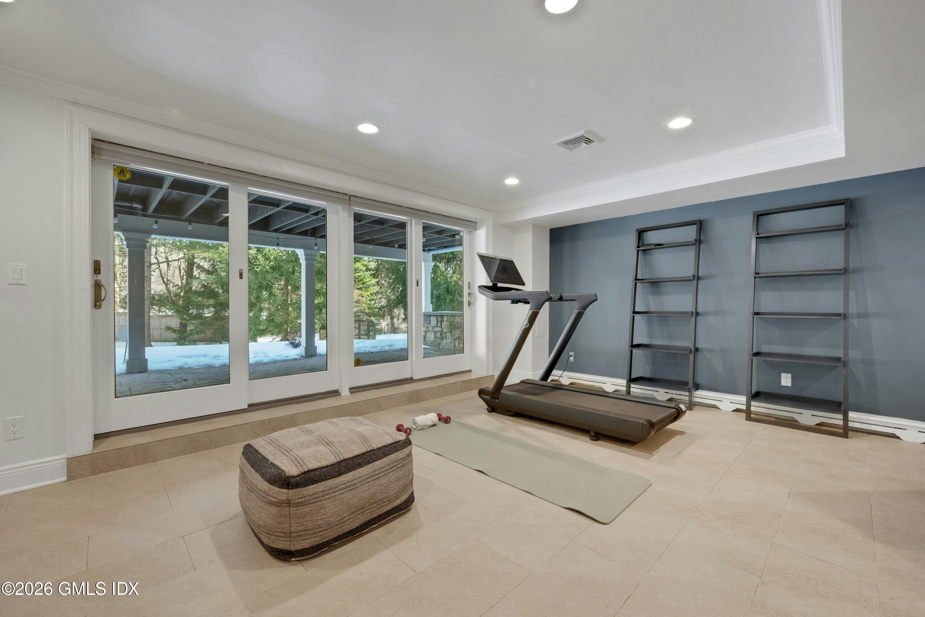 98 Hillcrest Park Road Cos Cob, CT 06807 - Photo 19 of 27 a view of a room with gym equipment