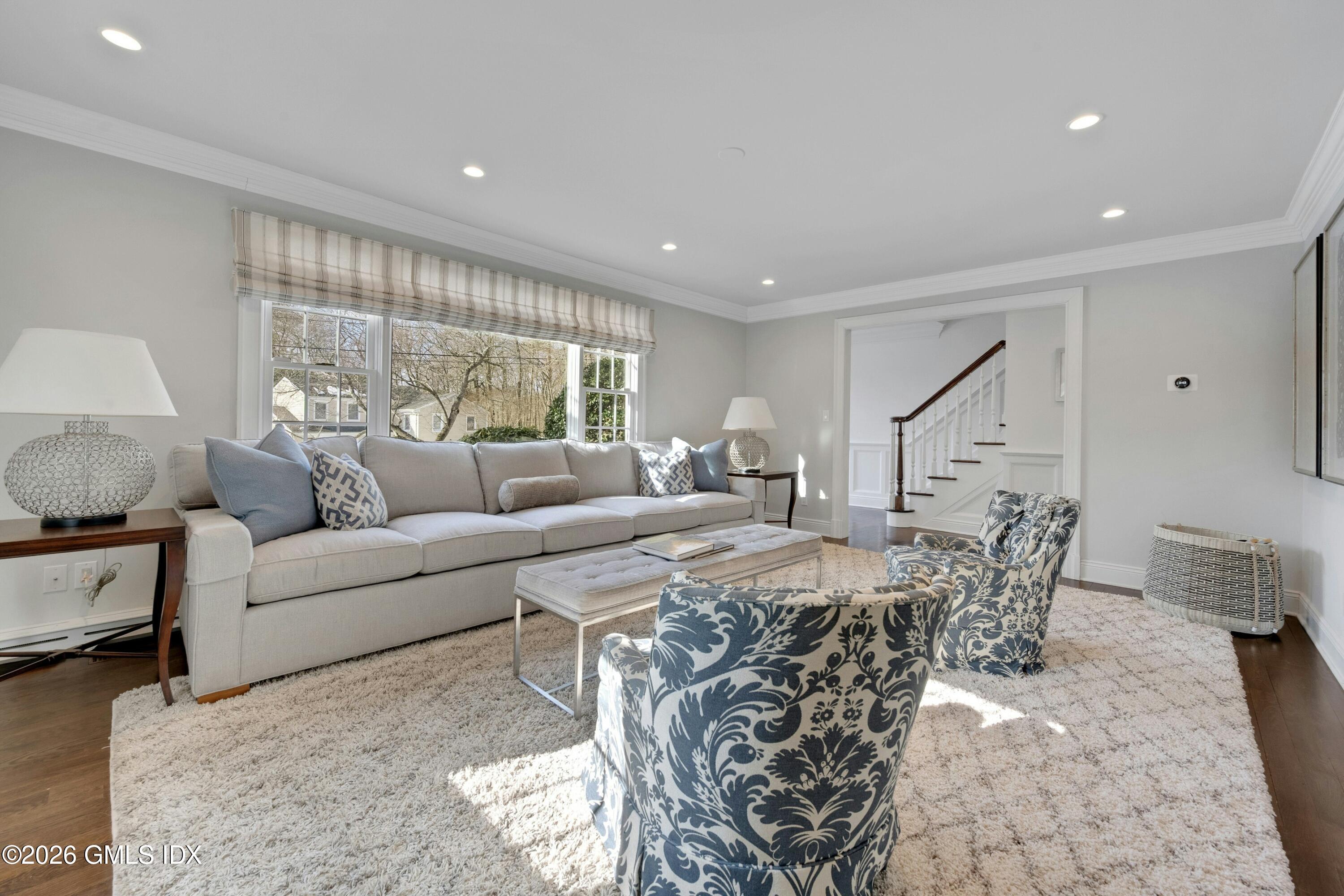 98 Hillcrest Park Road Cos Cob, CT 06807 - Photo 5 of 27 a living room with furniture and a large window