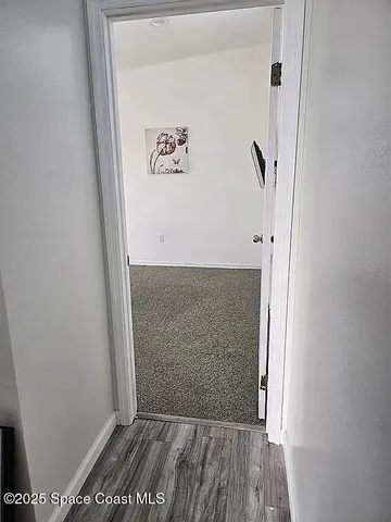 a view of a workspace with furniture