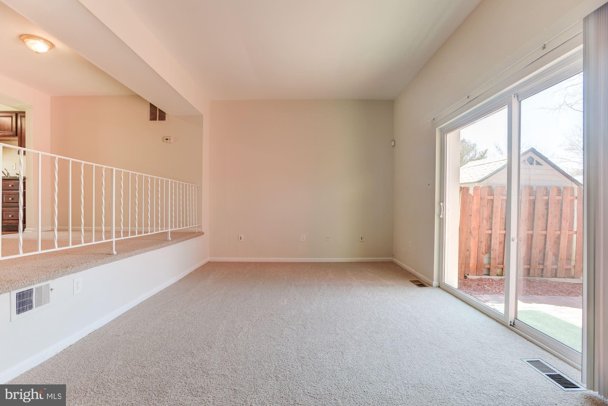 5624 Gulf Stream Row Columbia, MD 21044 - Photo 13 of 34 Living Room | Access to Patio