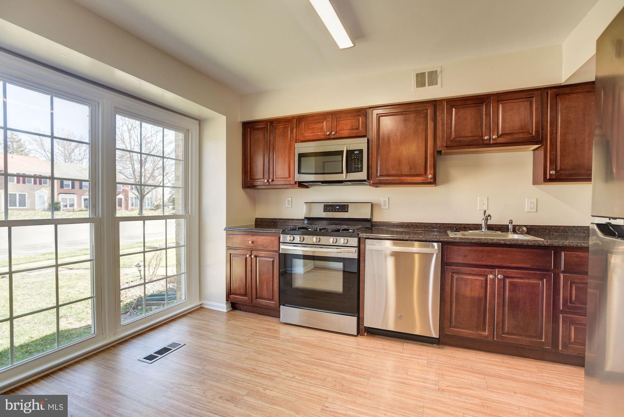 5624 Gulf Stream Row Columbia, MD 21044 - Photo 2 of 34 Eat-In Kitchen | Sleek Stainless Steel Appliances