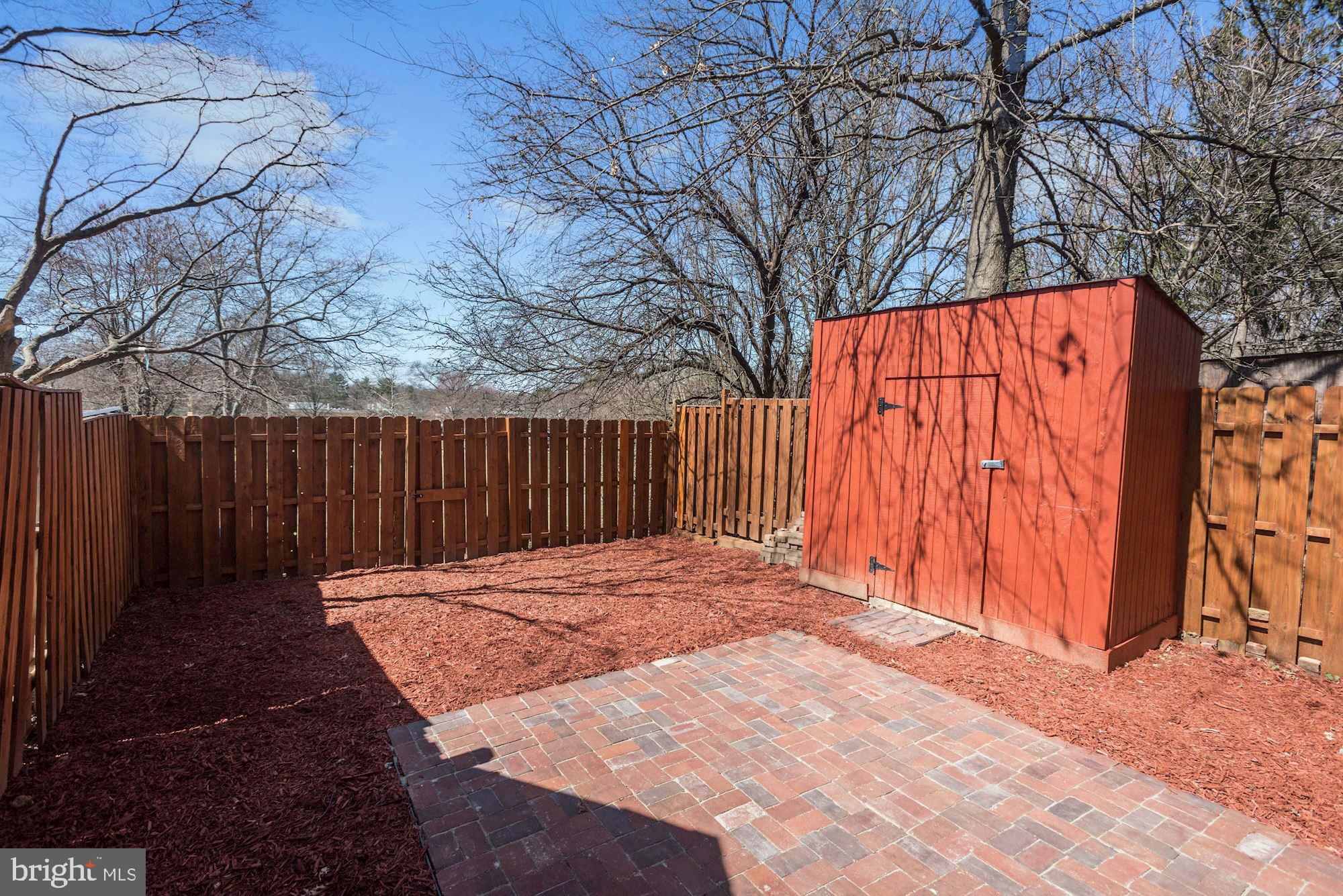 5624 Gulf Stream Row Columbia, MD 21044 - Photo 29 of 34 Secure Storage | Patio | Fenced Backyard