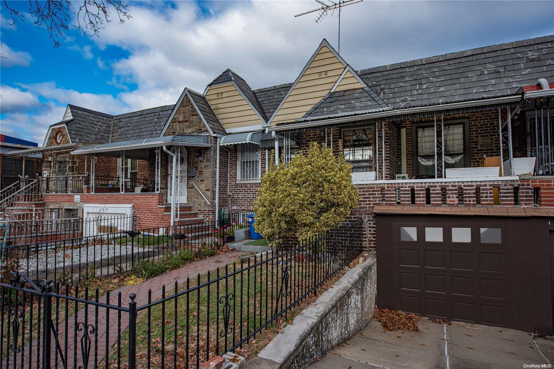 a front view of a house with a porch