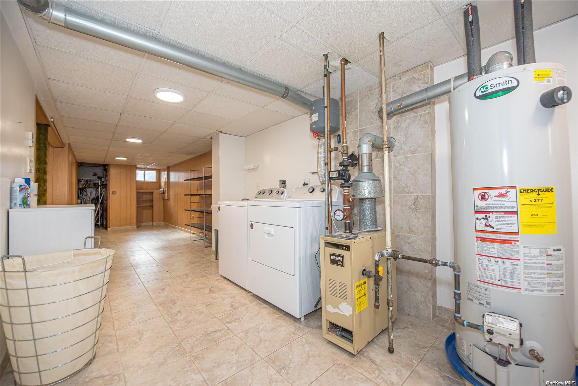 53-15 37th Road Queens, NY 11377 - Photo 19 of 25 a view of a kitchen and utility room
