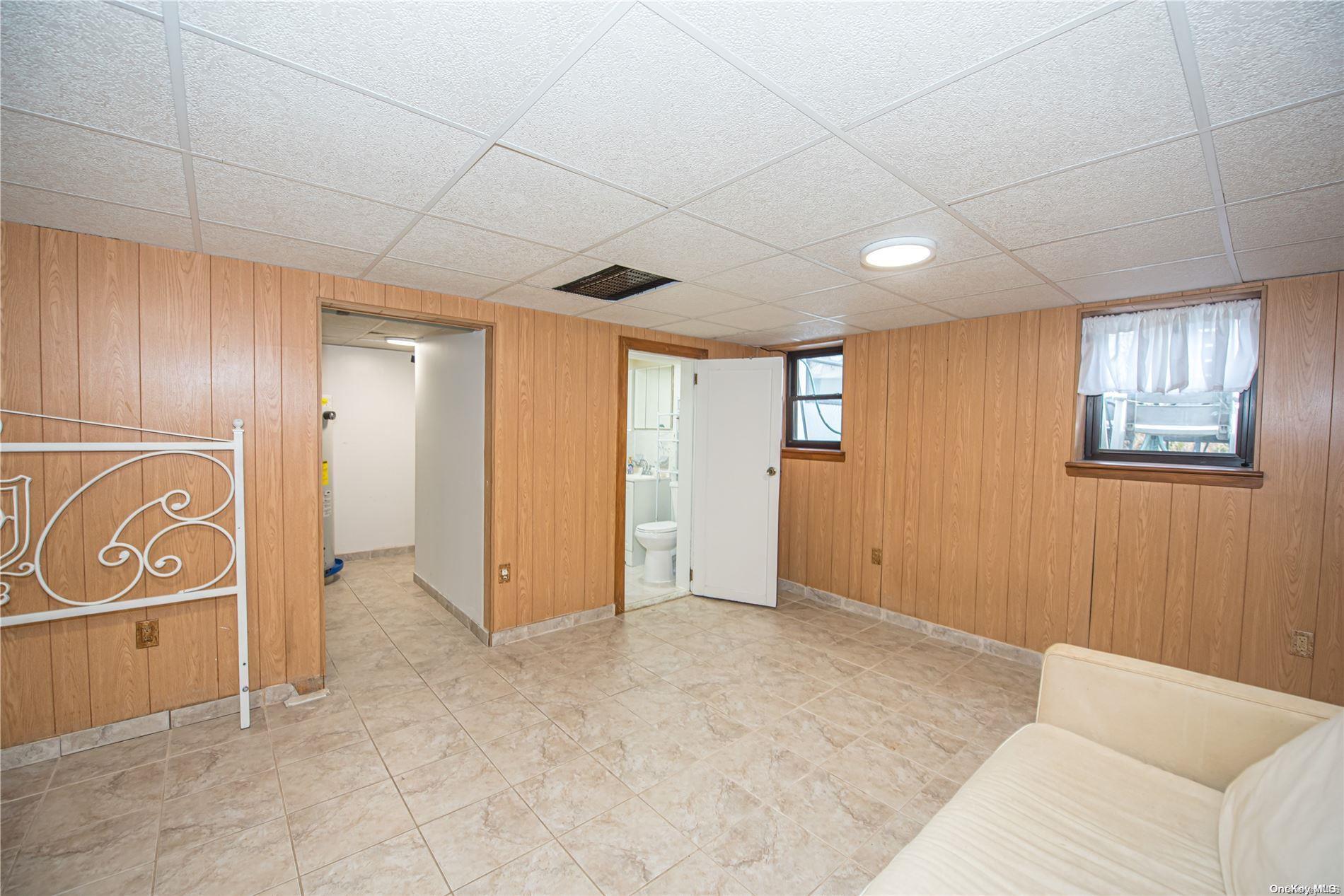 53-15 37th Road Queens, NY 11377 - Photo 21 of 25 a view of an empty room with window